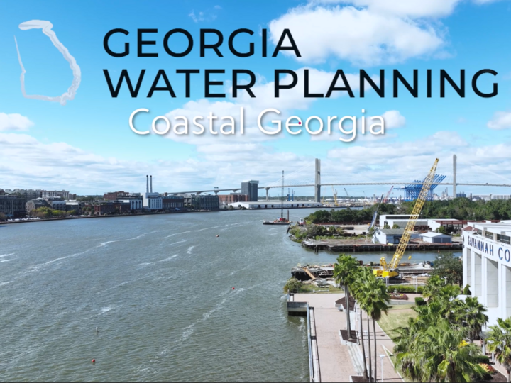 Cover Picture of water with buildings and vegetation along the shores